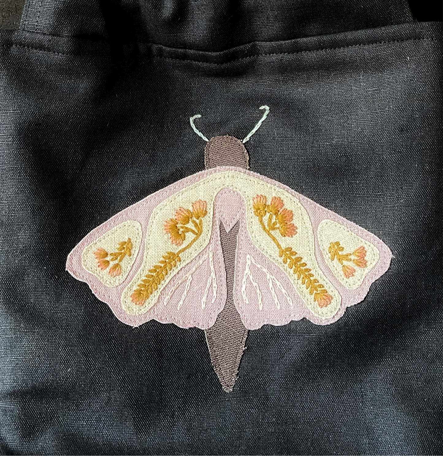 Pink moth small
