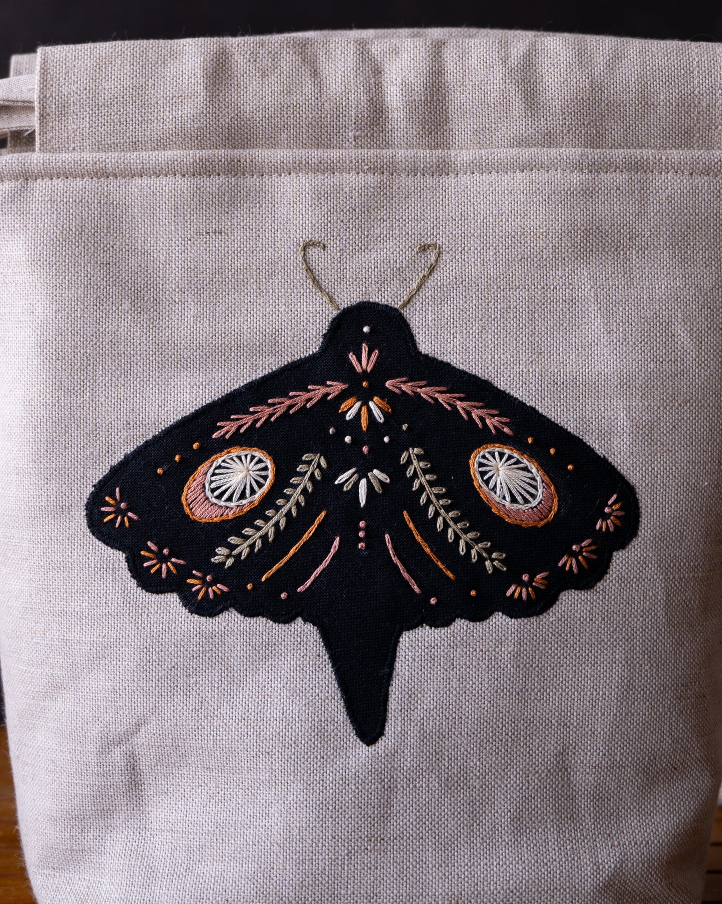 Black moth small pink