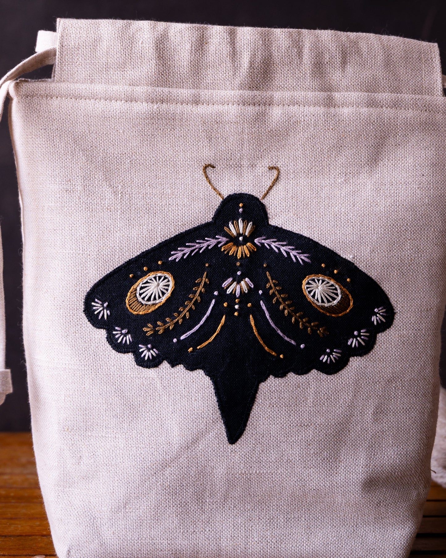 Black moth small purple dark