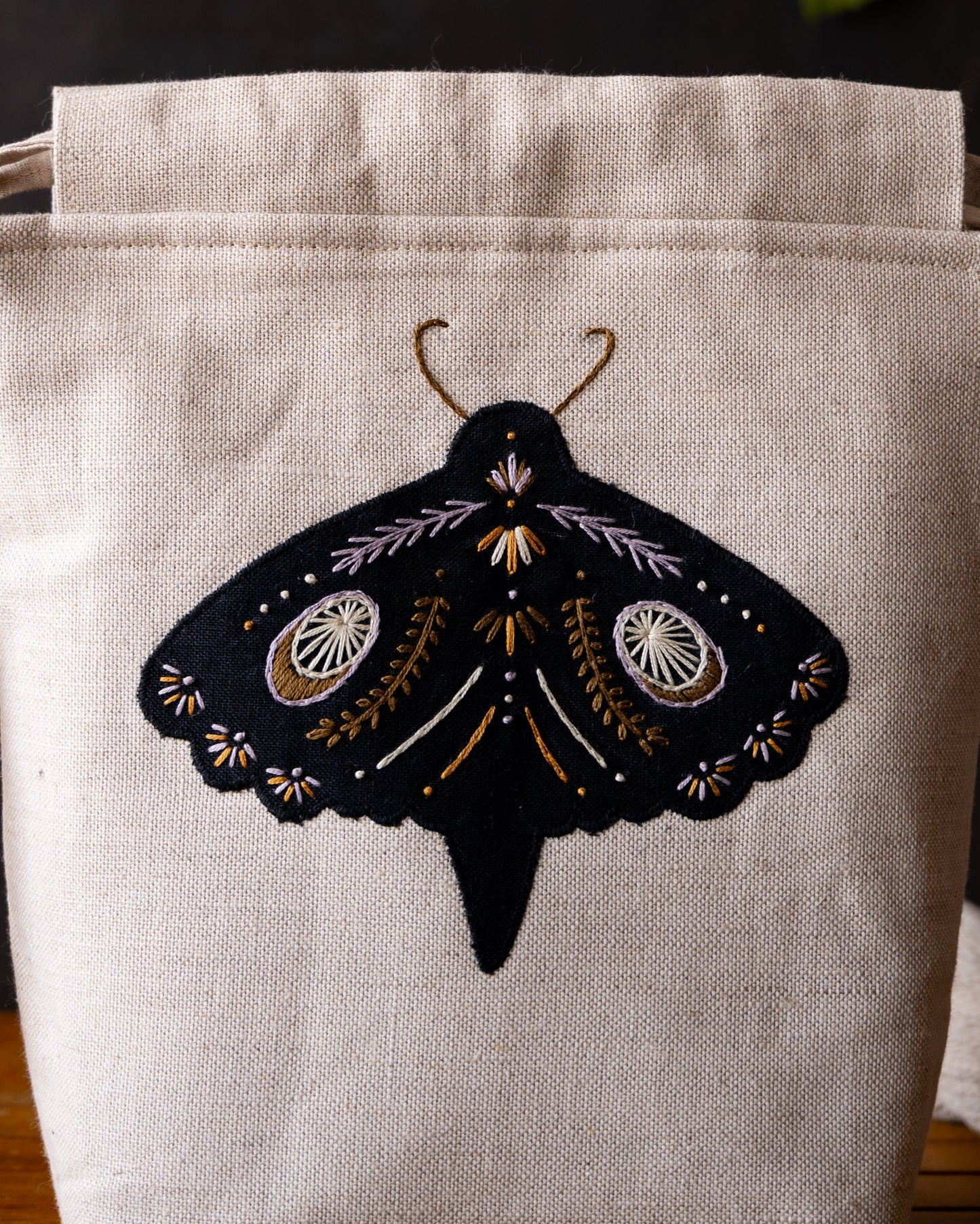 Black moth small purple