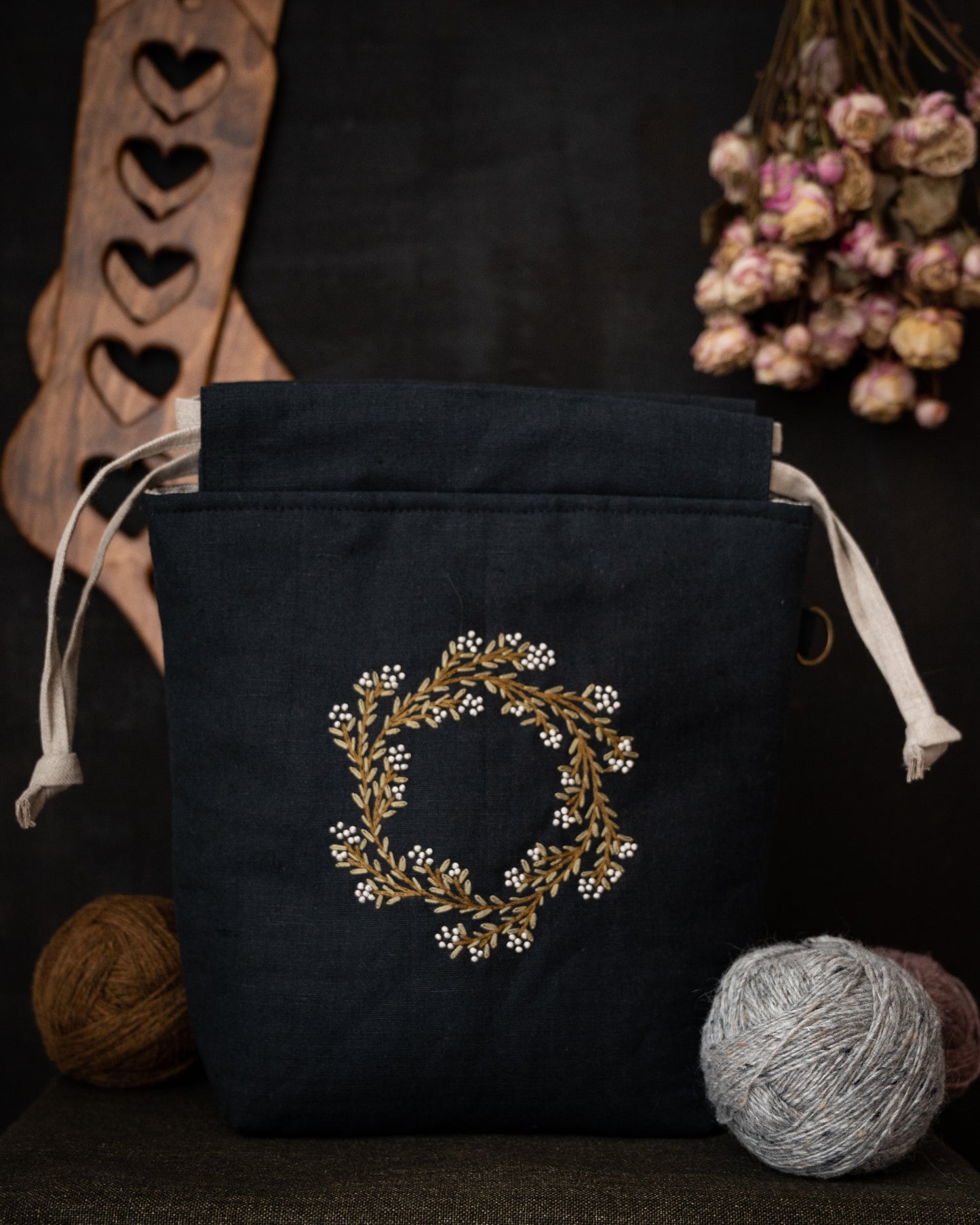 Spring wreath on black small bag