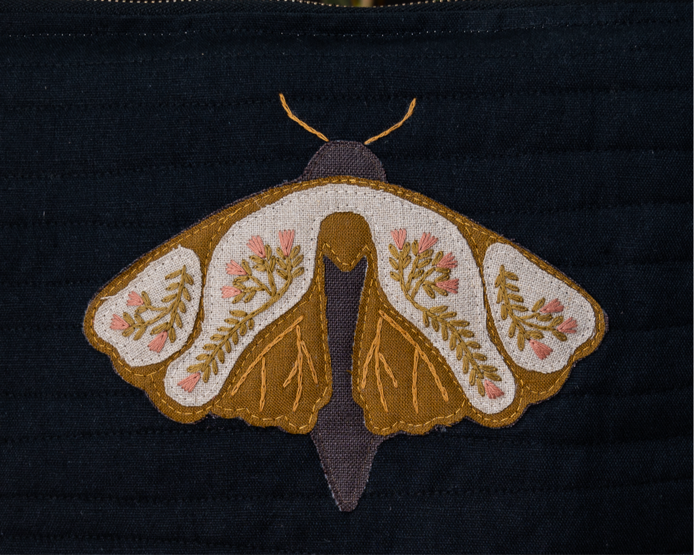 Golden moth bag