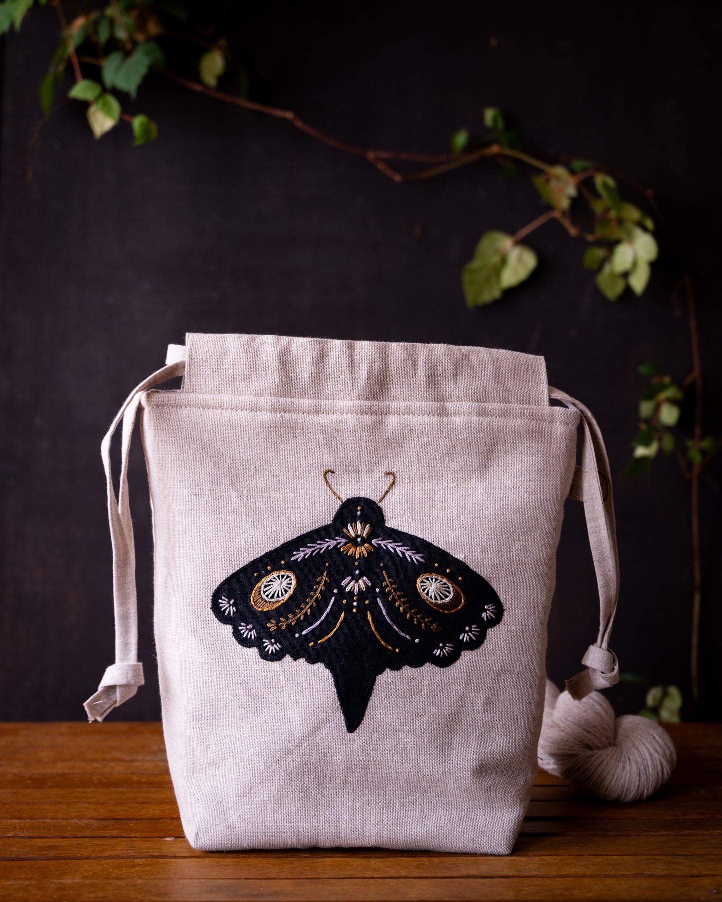 Black moth small purple dark